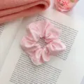 Pink fabric scrunchie with white polka dots and elegant pleated design for daily hair styling - Polka Dot Style / Light Pink