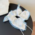 Elegant French style floral scrunchie with blue lace edges for women's hair styling. - Butterfly Blue