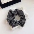 Black and white polka dot hair scrunchie with elegant white floral lace border detail - Black Polka Dot Hollow Lace Scrunchie