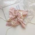 Elegant pink checkered daisy scrunchie featuring pearl bow and long flowing ribbon - Floral Ribbon Pearl Bow Style / Pink Plaid