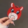 Close-up of a red cartoon horse embroidery hair sticker with a crying expression - Crying Horse Style (125584) / 1 Piece
