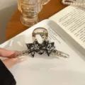 Eleganter Vintage-Haarclip mit zwei schwarzen Sternen und silbernem Glitzereffekt - Schwarzer Stern Transparente Basis