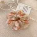 Chouchou en mousseline à motif floral avec imprimé aquarelle orange et jaune - Orange