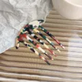 Pic à cheveux en acétate coloré en forme de U avec motif marbré pour chignons femmes. - Peigne à six dents / Multicolore