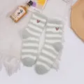Cozy sage green and white striped coral fleece fuzzy socks for warm winter sleeping - Green and White Striped