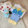 Calcetines acogedores de forro polar coral azul y púrpura con diseño de payaso lindo - Talla única / Azul claro
