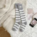 Soft grey and white striped coral fleece knee-high socks for cozy winter sleep - One Size / Grey/White