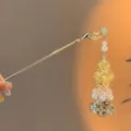 Vintage Chinese gold hairpin featuring delicate pearl tassel and hollow lantern design - 6# Luminous Lantern Hair Stick - Cold Flute