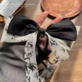Pince à cheveux élégante de style chinois avec nœud motif bambou à l'encre de Chine - Style Ruban Bambou à l'Encre