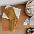 Mustard yellow cable-knit cashmere crew socks, thick and cozy for winter warmth and style. - Size 34-40 / Turmeric