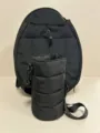 Detailed close-up of a black quilted sports accessory pouch with an adjustable strap - 20L / Quilted Sports Set / Black