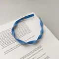 Sweet blue mesh braided headband with a flat twist design and soft fabric texture. - Flat Twist Braid / Blue Spiral Style