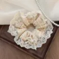 Elegant floral lace scrunchie with pearl bow detail for bun styling - Lace Pearl Bow Hair Scrunchie