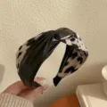 Cerchietto con nodo a incrocio leopardato bicolore per volume extra ai capelli. - Bianco avorio
