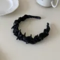 Black twisted fabric headband with spiked resin horn details for women - Black Rhinestone Bow