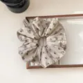 Vintage floral pleated fabric scrunchie hair tie in beige for elegant low ponytail style - Floral Rose Style / Khaki