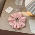 Elegant pink satin scrunchie with vintage French aesthetic for daily hair styling - Pink