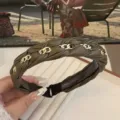 Elegant braided faux leather headband with gold chain detail in olive green finish - Olive Green