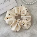 Elegant cream satin scrunchie with black polka dots for stylish hair accessories - Polka Dot / Beige
