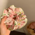 Sweet floral fabric scrunchie hair accessory with an elegant pink rose pattern design - Smoky Pink Rose