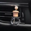 Botella de perfume para coche de cristal transparente con tapa de madera en la rejilla. - Botella plana ovalada para rejilla de ventilación