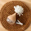 Car air vent perfume diffuser bottle with white flower clip decoration for fresh vehicle aroma. - Spherical (6ml) / Clear