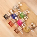 Colorful 8ml square car air vent perfume diffuser bottle with wooden cap and metal clip. - Black