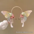 Fascia per capelli con ali di farfalla, fiori di seta e perle, diametro di 12 cm, stile fata - Cerchietto Farfalla Elfo Cangiante / Aurora boreale