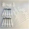 Perfume dispensing tool set, includes plastic syringes, funnels and droppers for essential oils. - 35-Piece Dispensing Set / Clear