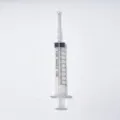 Detailed close-up of clear plastic syringe with measurement scales for precision liquid dispensing. - 10ml / Clear