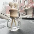 Car air vent perfume glass diffuser bottle with natural wooden cap and metal clip variant - Double-Hole Flat Round 10ml