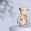 Mini glass car perfume diffuser bottle with wooden lid and cute snowman decor detail - Snowman