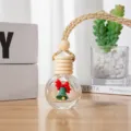 Close-up detail of the Christmas car perfume bottle pendant with wooden cap and hanging rope. - Christmas Bell