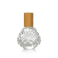 Élégante bouteille à bille en verre de 15 ml avec bouchon en bambou et design facetté. - 15ml / Transparent