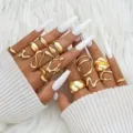 Moderne minimalistische goudkleurige geometrische ringen set met gepolijste oppervlakken - Lavallijn 15-delige set (6240301HB)