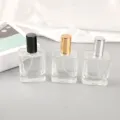 Flacons vaporisateurs de parfum en verre transparent avec bouchons vides rechargeables cosmétiques - 50ml / Spray doré