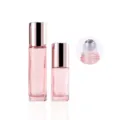 Bottiglia roller in vetro rosa con tappo oro rosa per oli essenziali e profumo viaggio - 10ml / Flacone oro rosa traslucido con tappo lucido e sfera in acciaio