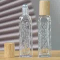 Flacon roll-on en verre carré de 10 ml avec bouchon en bois pour huiles essentielles. - 12ml / Relief Ponctué (Bille en Acier)