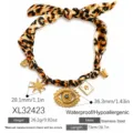 Leopard print scarf necklace with gold evil eye and poker charms in stainless steel. - Evil Eye Poker Necklace (XL32423)