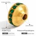 Perla distanziatrice in acciaio dorato con cristalli verdi, variante da 8,3 mm - Stile Perlina Tamburo Piatto Geometrico (PJ94702J)