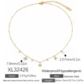 Collar de acero inoxidable dorado con estrellas de ocho puntas y dijes de cristal - Estilo Circonia Pavé de Estrella de Ocho Puntas y Redonda (XL32426)