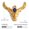 Detailed gold bull head pendant in stainless steel featuring an inlaid blue stone - Bull Head Blue Stone Gold (PJ94021)