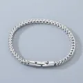 Elegante pulsera de cadena de trigo de acero inoxidable para hombre y mujer, joya pulida. - Ancho 4mm Largo 21cm / Color acero