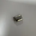 Macro view of a polished silver stainless steel magnetic clasp for jewelry making - Steel Smooth