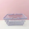 Detail view of pastel purple wire storage basket, metal picnic basket for home organization. - Medium (19x13.5x9cm) / Purple