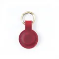 Portachiavi custodia AirTag in pelle rossa, astuccio rotondo portatile con anello in metallo. - Rosso Vino Crazy Horse
