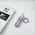 Purple leather lipstick case keychain with heart mirror pendant, chic bag charm accessory. - Purple Heart Mirrors