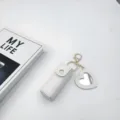 White leather lipstick holder keychain with cute heart mirror pendant for daily use. - White Heart Mirrors