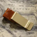 Vintage brass money clip and leather pen clip accessory for traveler notebook, elegant metal design. - Brass - Carved Camel