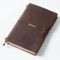 Vintage dark brown crazy horse leather traveler's notebook with elastic band and metal tag. - A5 Model / Crazy Horse Coffee